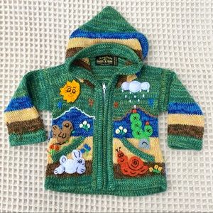 Peru green zip up hooded sweater size 12-24months